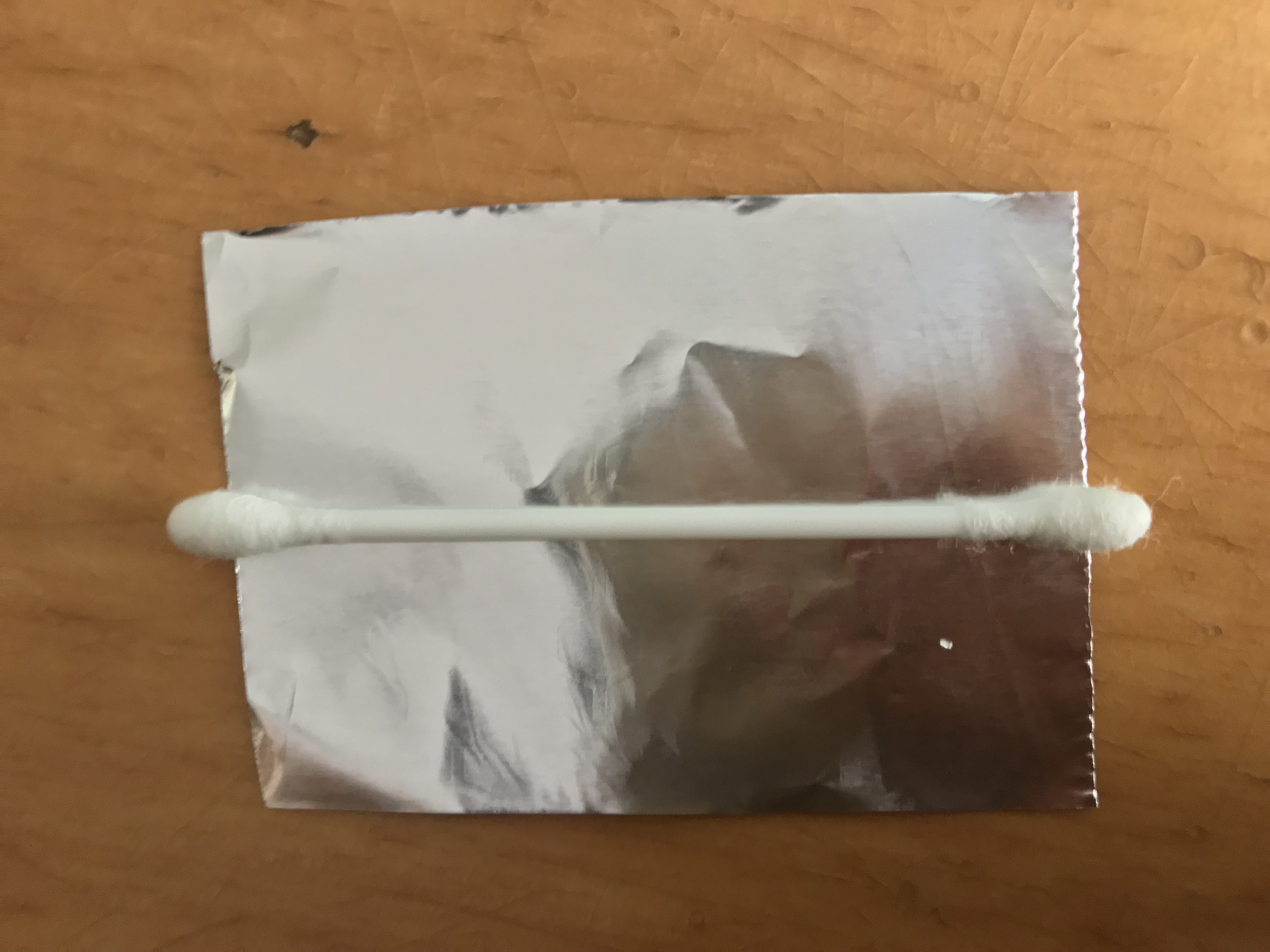 Bastoncillo y aluminio